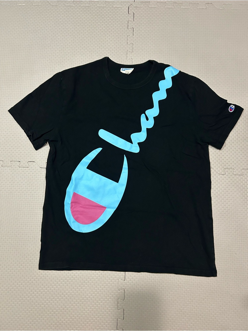Champion Men’s Black Graphic Swim Tee with Blue & Pink Logo
